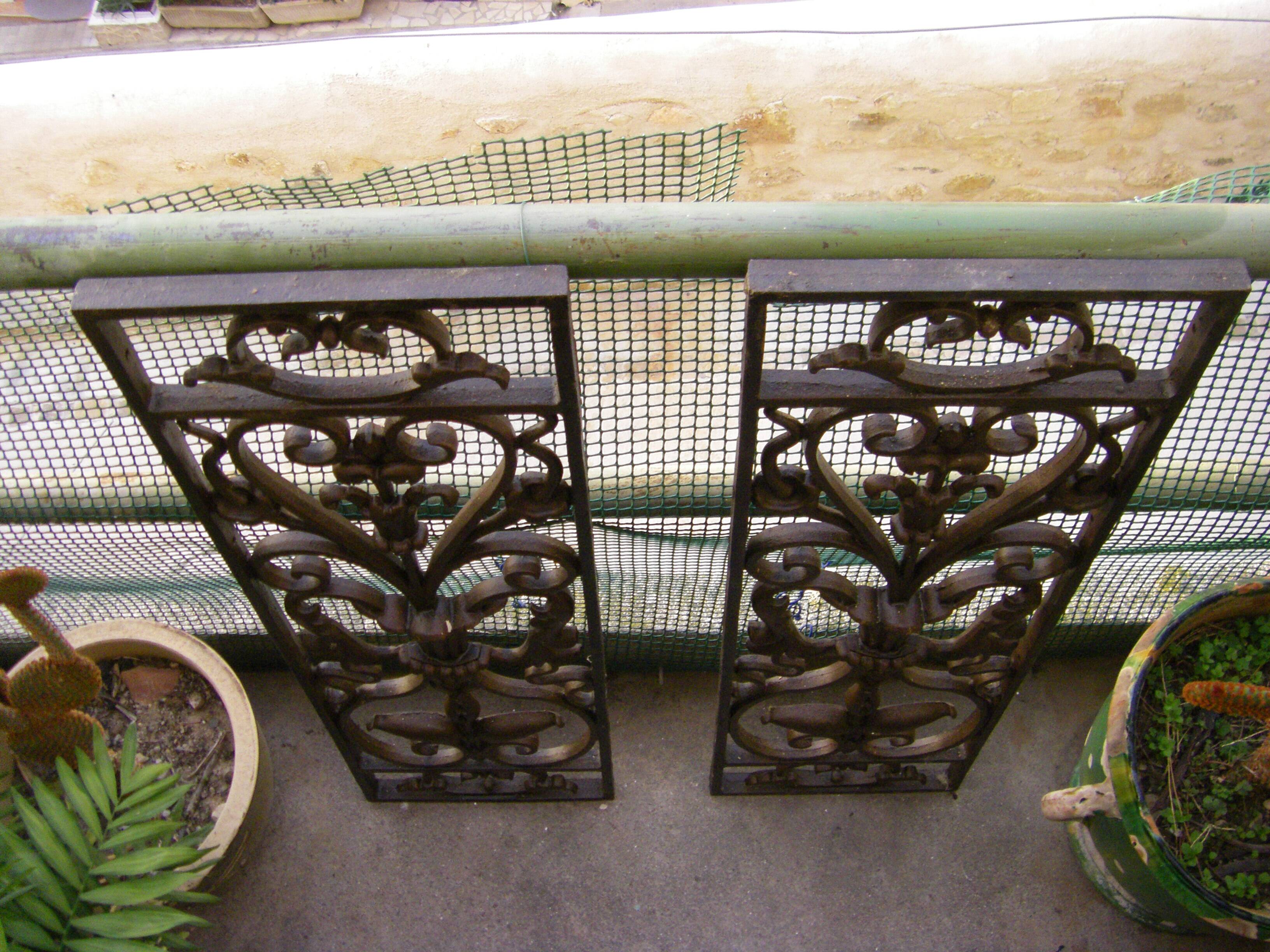 Pair of wrought iron door grilles from Dammarie