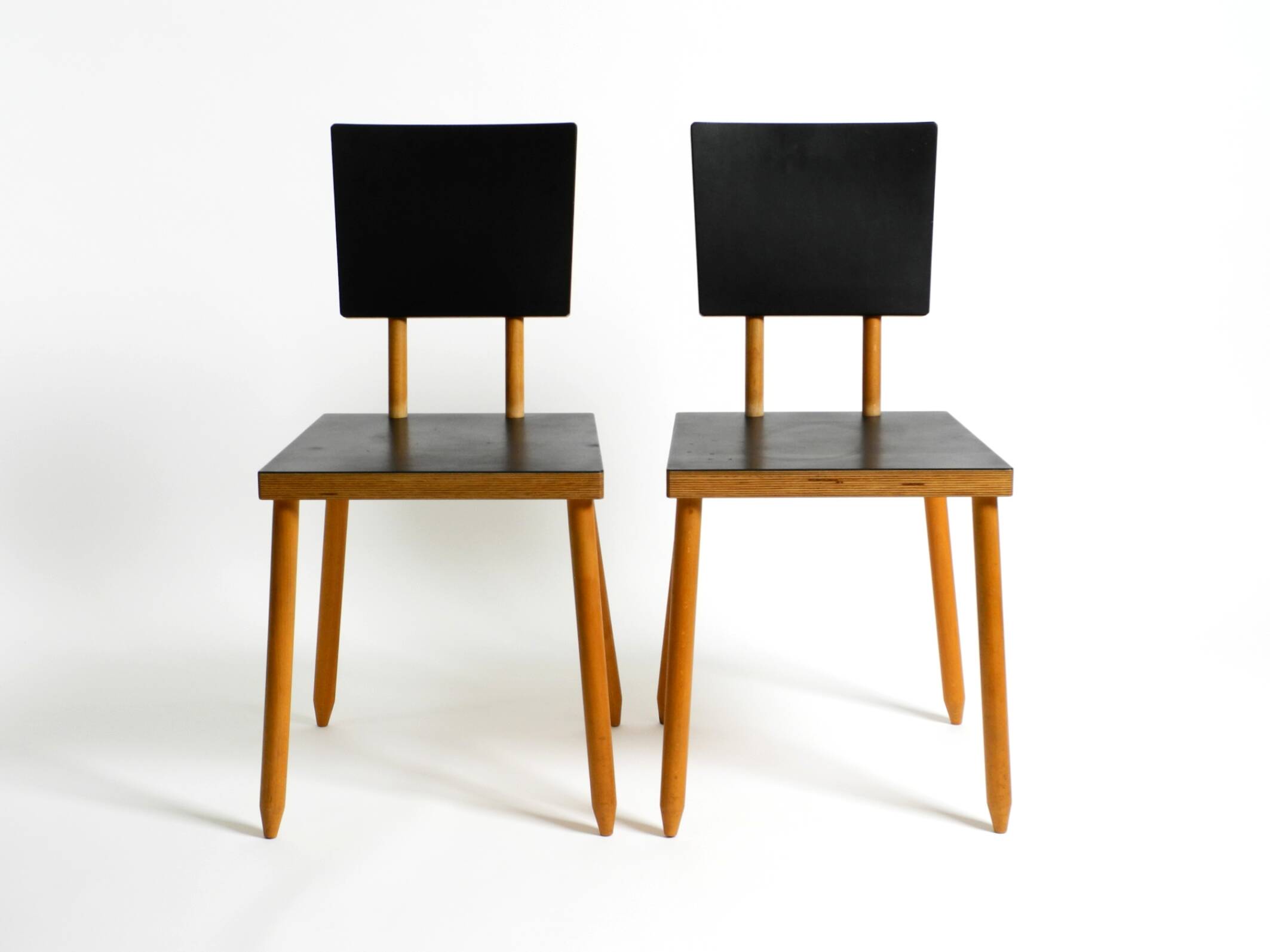 Two rare demountable plywood chairs by Axel Kufus model Stöcke for Atoll