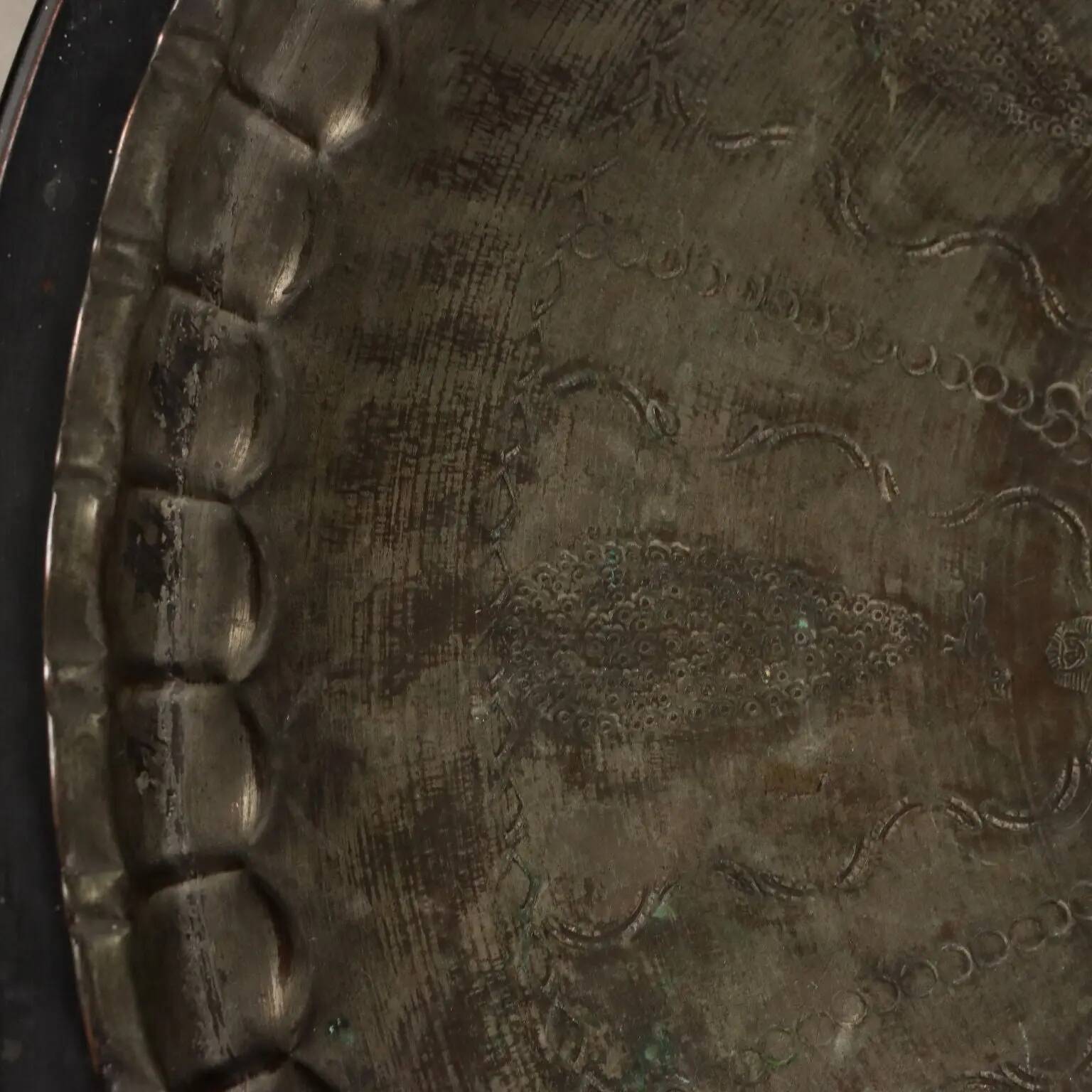 Large antique copper platter with Middle Eastern decorations, 20th century.