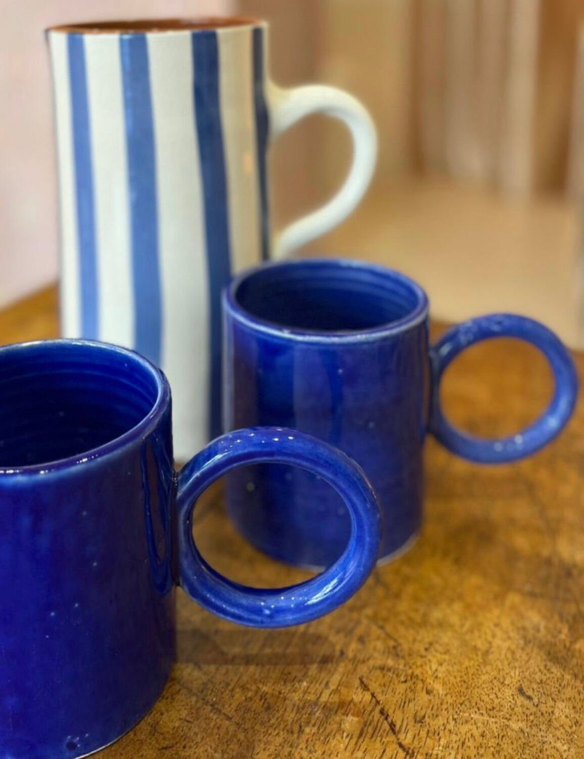 Majorelle blue ceramic mug, handmade, donut handle design.