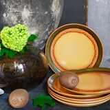 Six vintage stoneware plates with green net