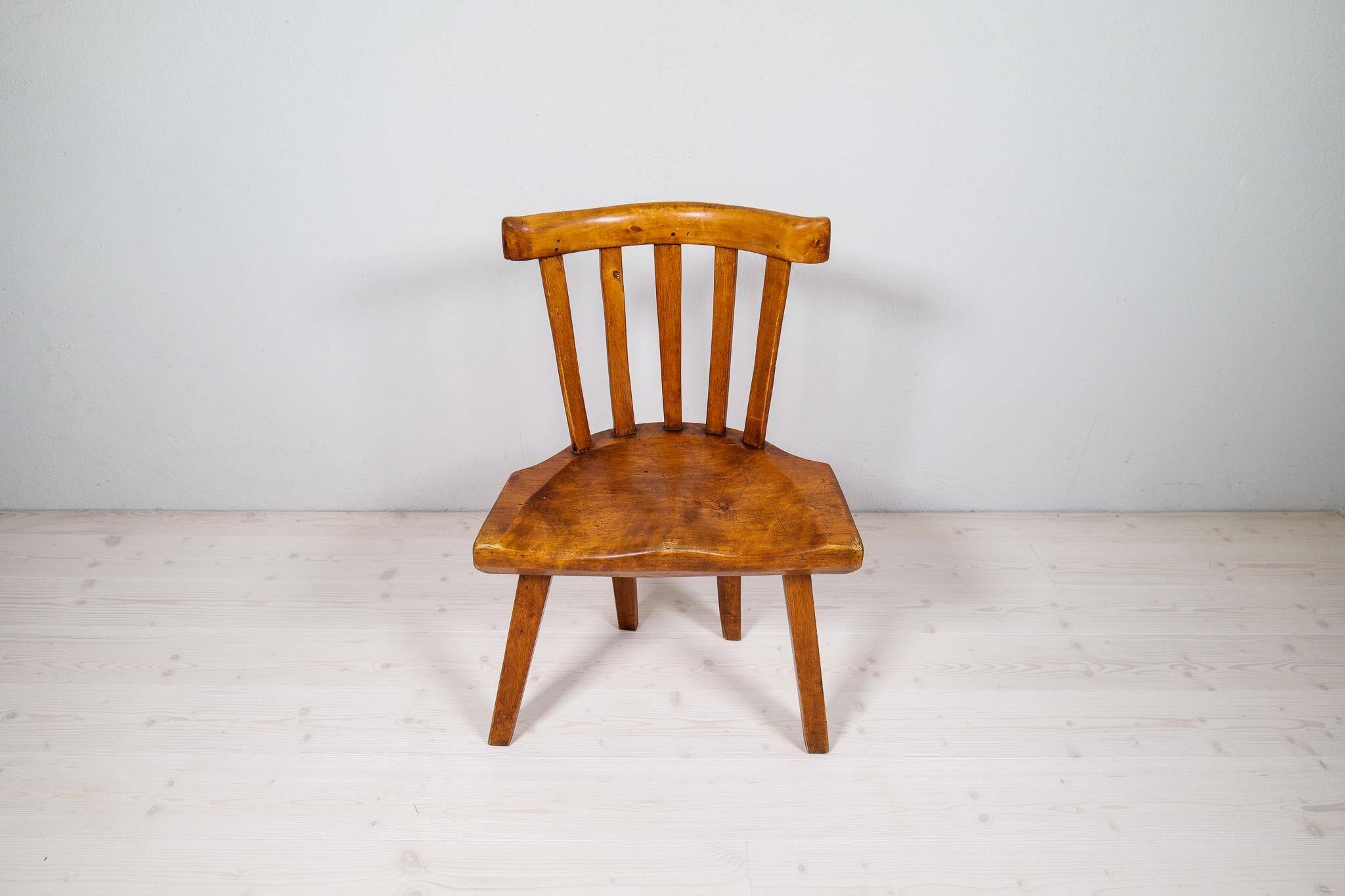 Swedish folk art chair from the 19th century with highly decorative forms.