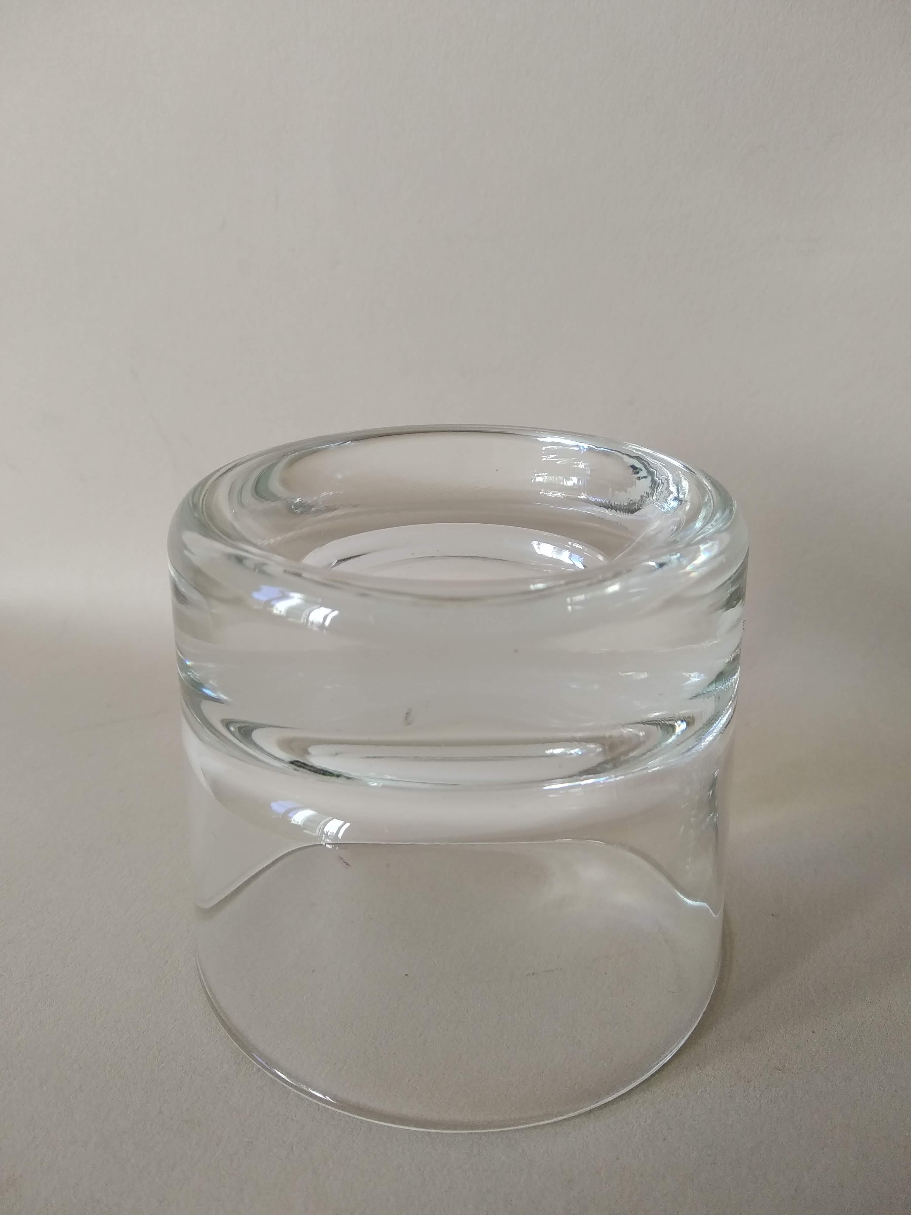 Glasses cups with thick bottom with water or vintage spirits 70