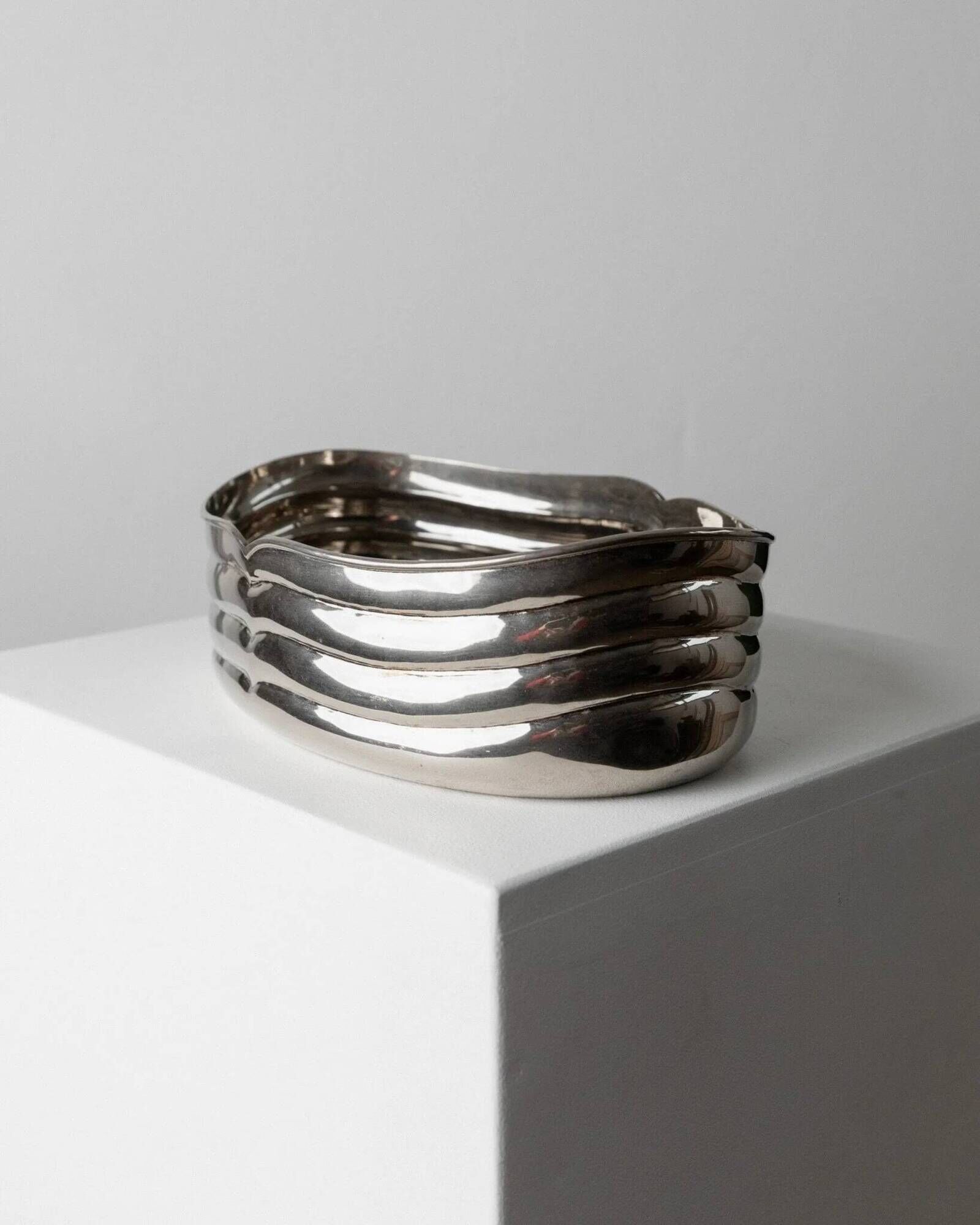 Vintage silver-plated metal bowl with curved relief design, Italy 1960s, elegant appetizer plate