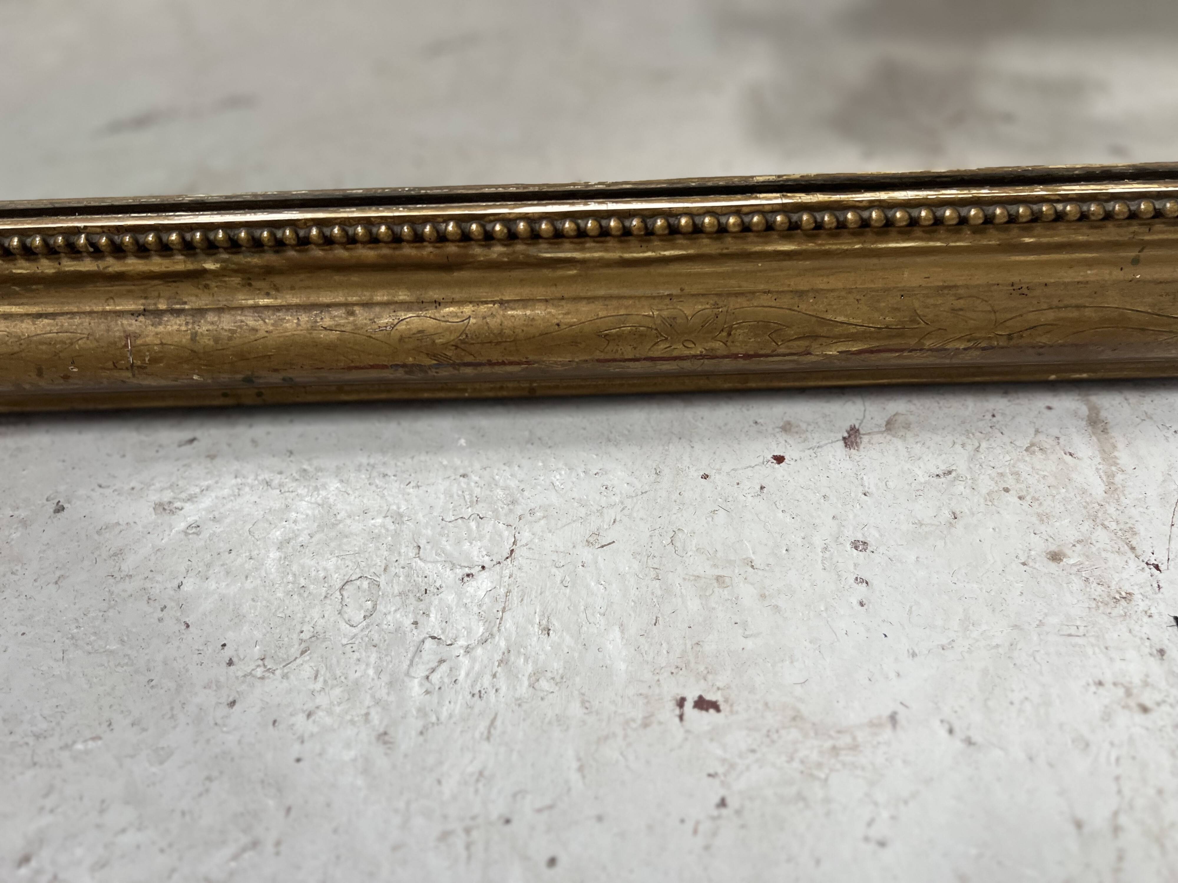 Louis Philippe mirror in wood and gilded stucco, 19th century