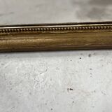 Louis Philippe mirror in wood and gilded stucco, 19th century