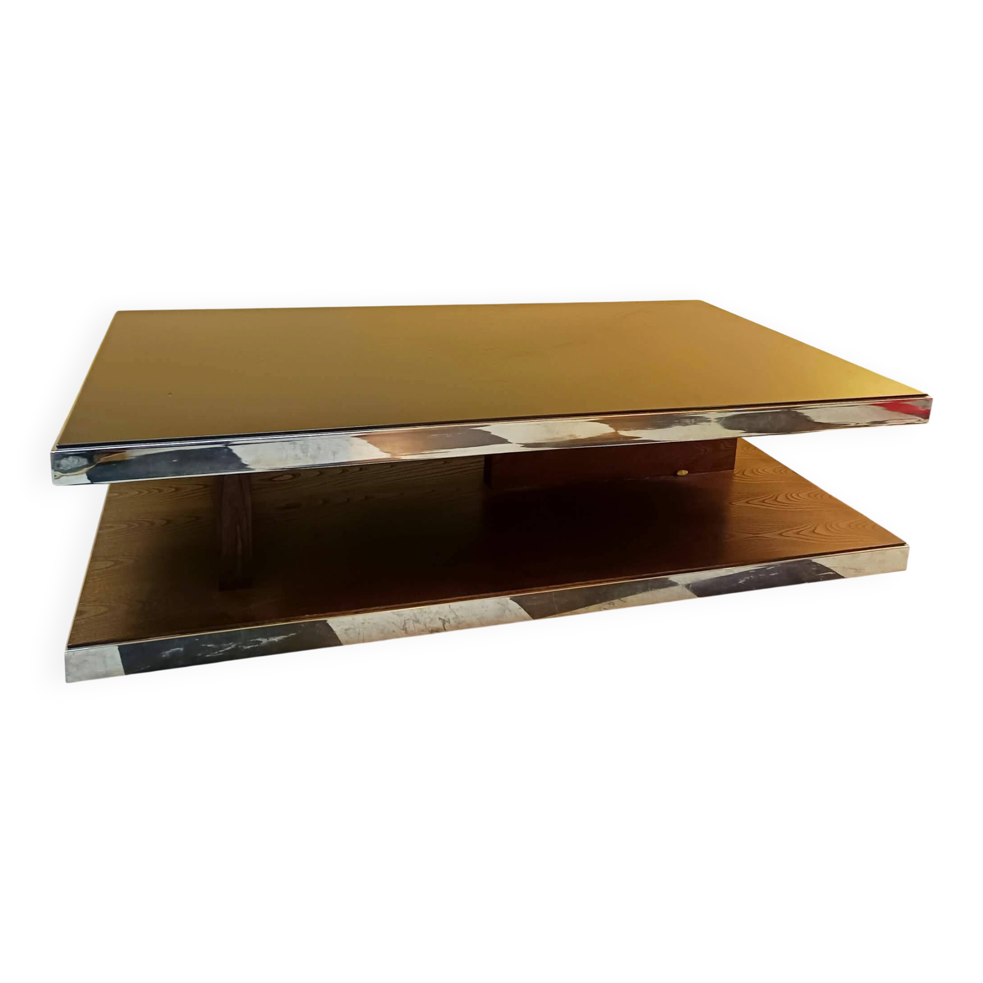 Designer coffee table in glass and chrome metal.