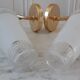 Pair of glass and gilded metal sconces 50s