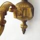 Pair of simple vintage French wall sconces in Art Nouveau bronze with leaf-shaped details.