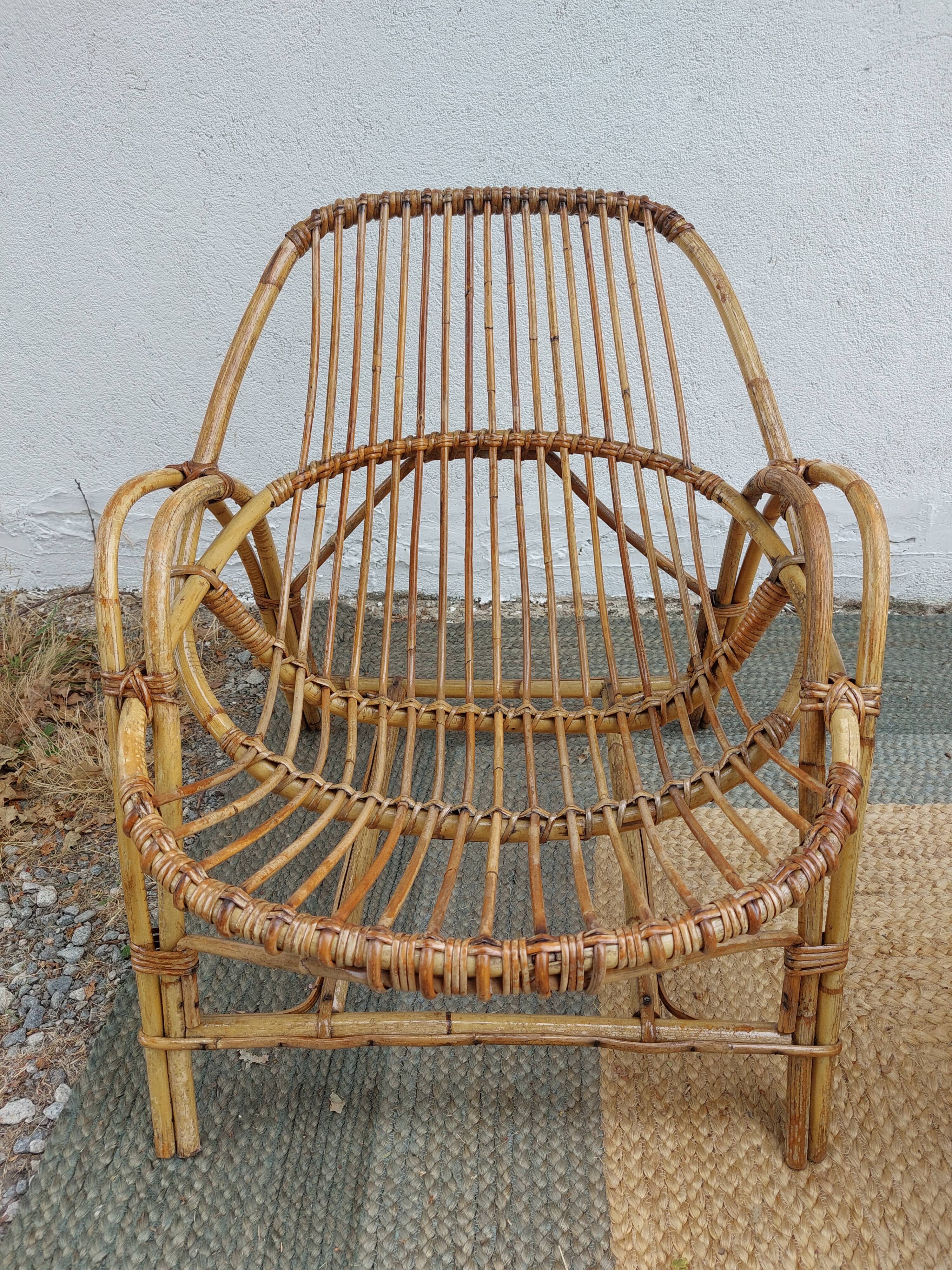 4 armchairs and a coffee table made of rattan and bamboo wood, vintage.