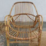 4 armchairs and a coffee table made of rattan and bamboo wood, vintage.