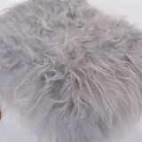 Danish Mid-century Modern stool reupholstered in grey sheep skin