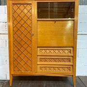 Wardrobe, desk, wooden and rattan chest of drawers, 1960s.