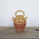 Old gargoulette pot in glazed terracotta