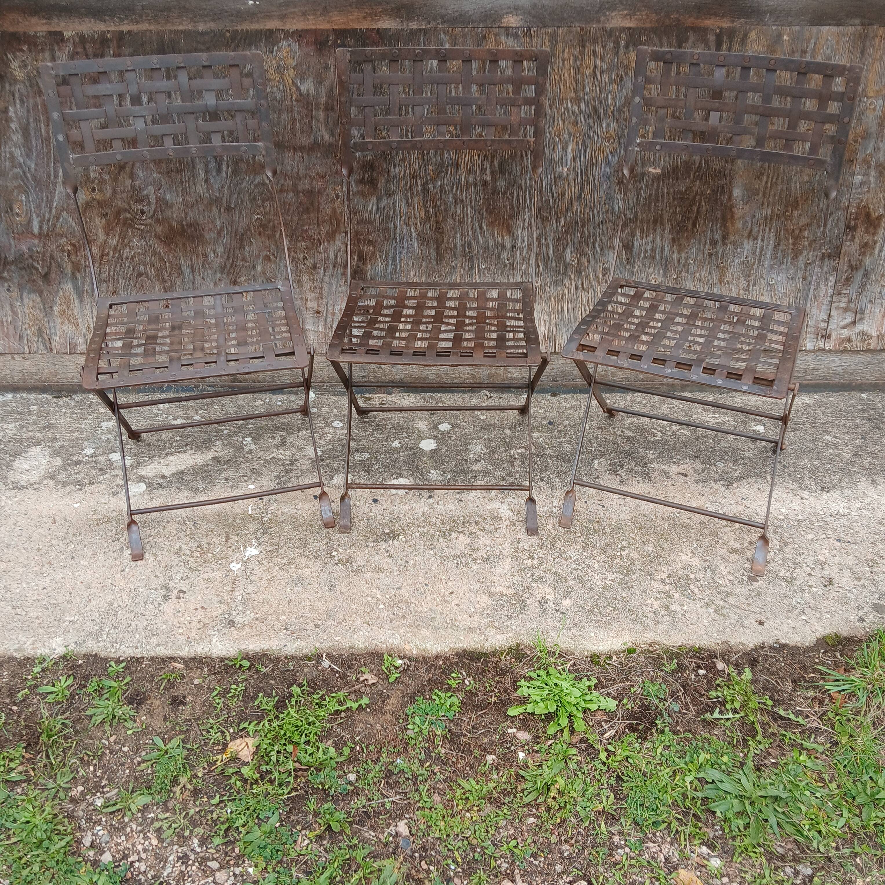 3 wrought iron chairs