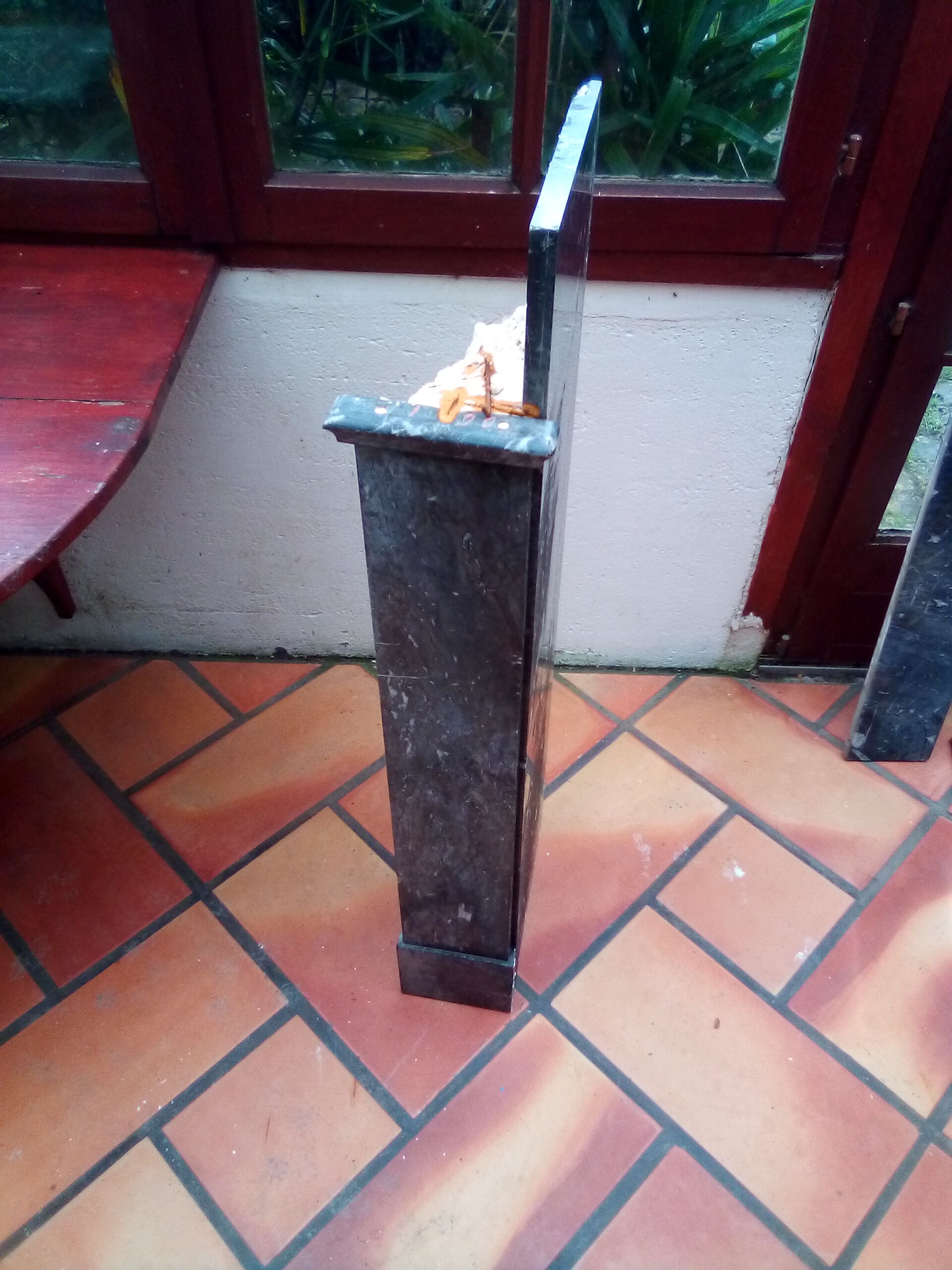 White veined black marble fireplace