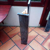 White veined black marble fireplace