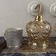 Set of two vintage amber glass wall lights