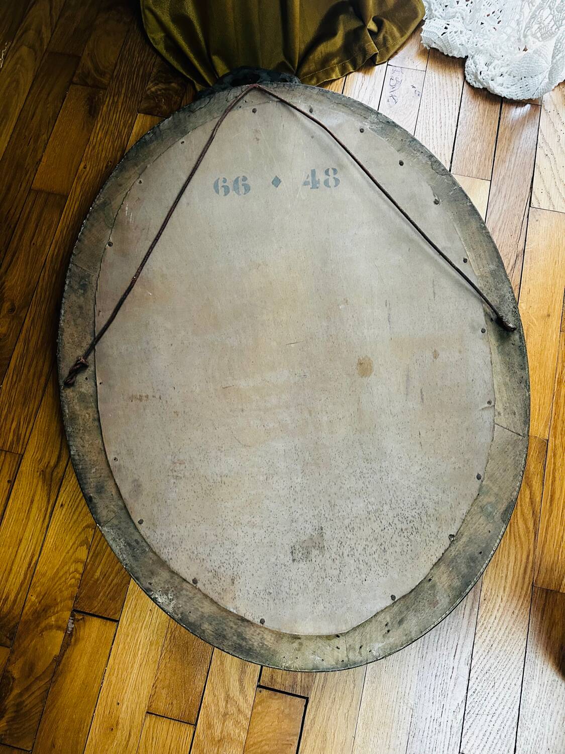 Large antique oval mirror