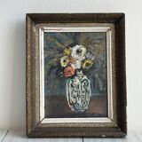 Vintage painting of flowers in a vase.