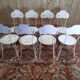 Suite de 8 chaises de jardin en fer forgé