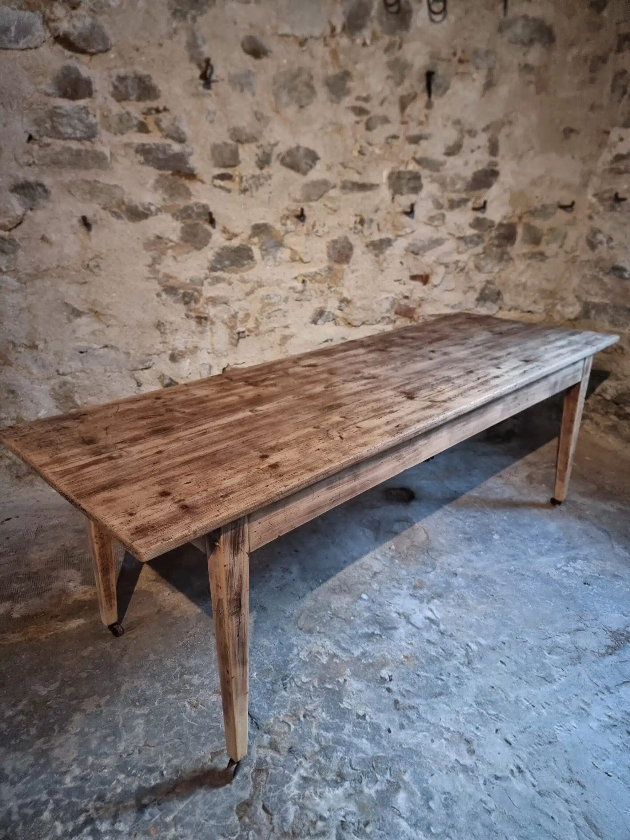 Antique French pine dining table, large farmhouse table on wheels, 19th century.