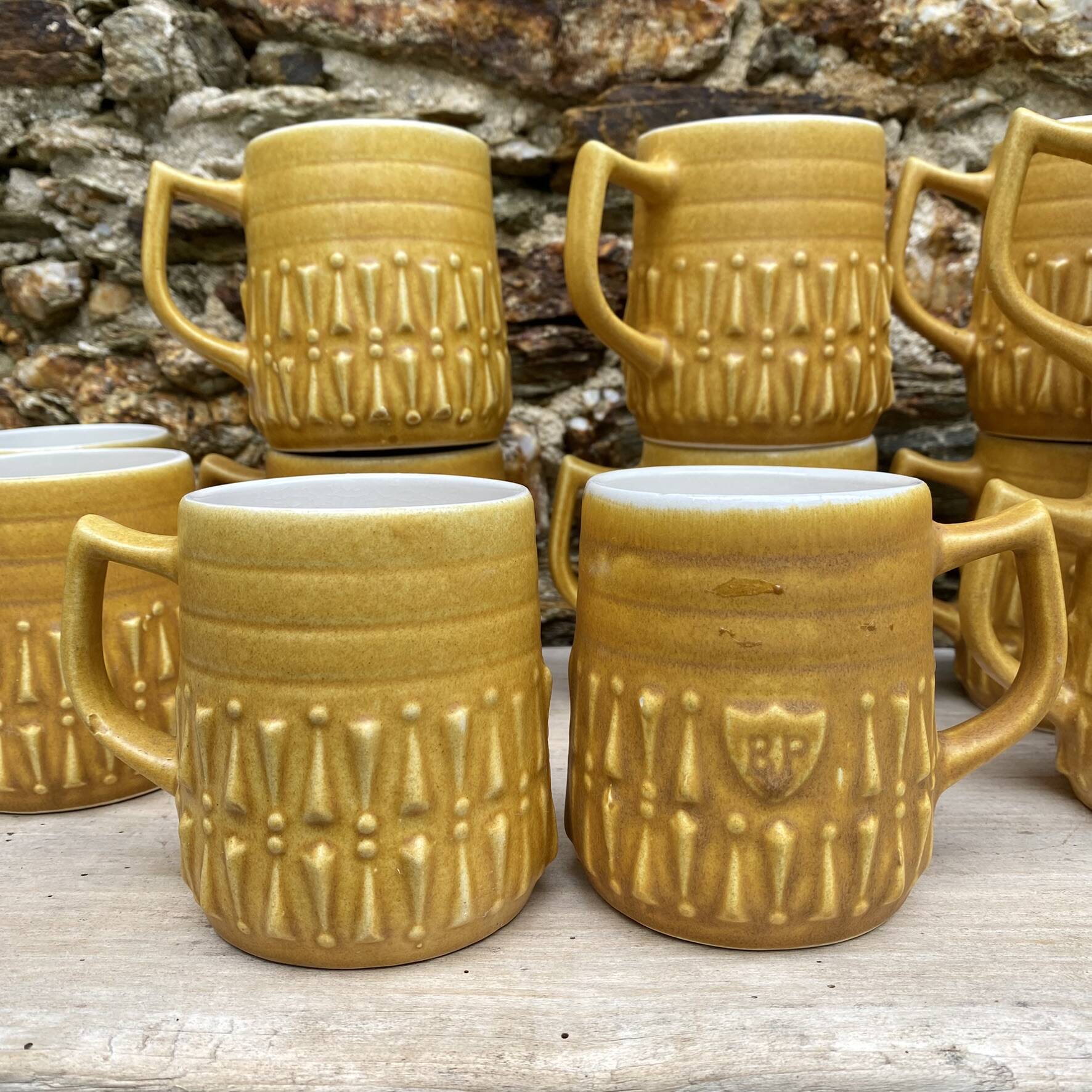 Vintage BP ceramic mugs from the 1970s.