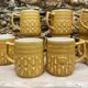 Vintage BP ceramic mugs from the 1970s.