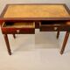 Bureau plat en acajou xixème dessus cuir