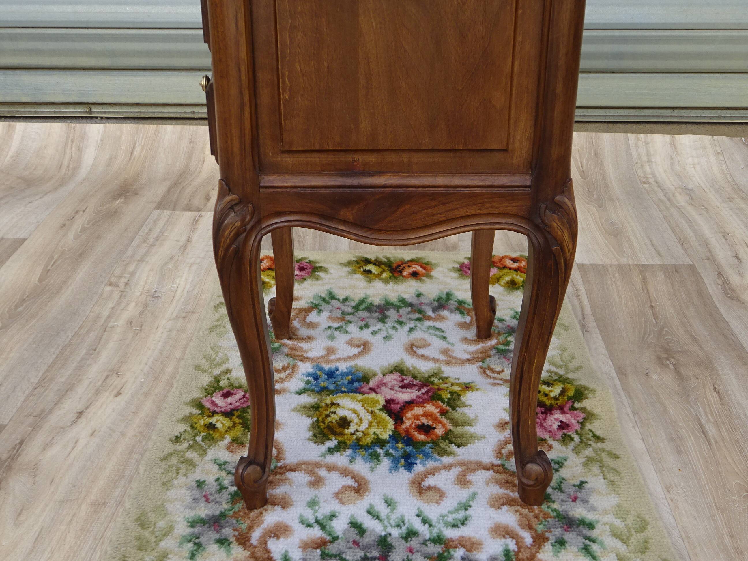 Louis XV bedside table in walnut, 3 drawers, raised edges on the tops.