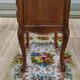 Louis XV bedside table in walnut, 3 drawers, raised edges on the tops.