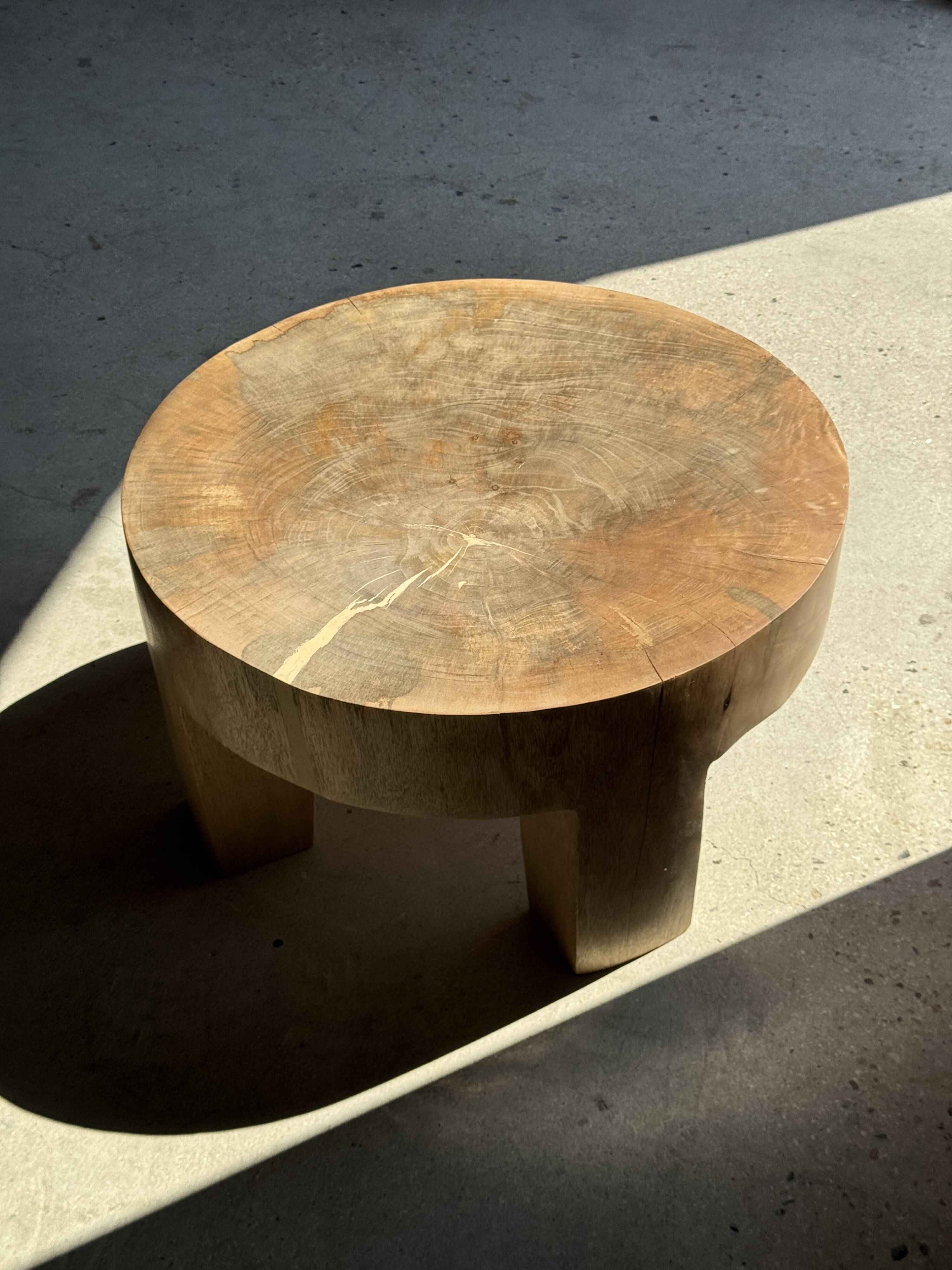 Coffee table, four-legged low table in natural solid monoxyle mango wood.