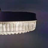 Ceiling light, in dark metallic paint with thick glass shade with beautiful details in the glass.