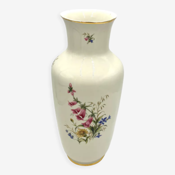 Porcelain flower vase with Digitalis purpurea L.