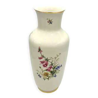 Porcelain flower vase with Digitalis purpurea L.