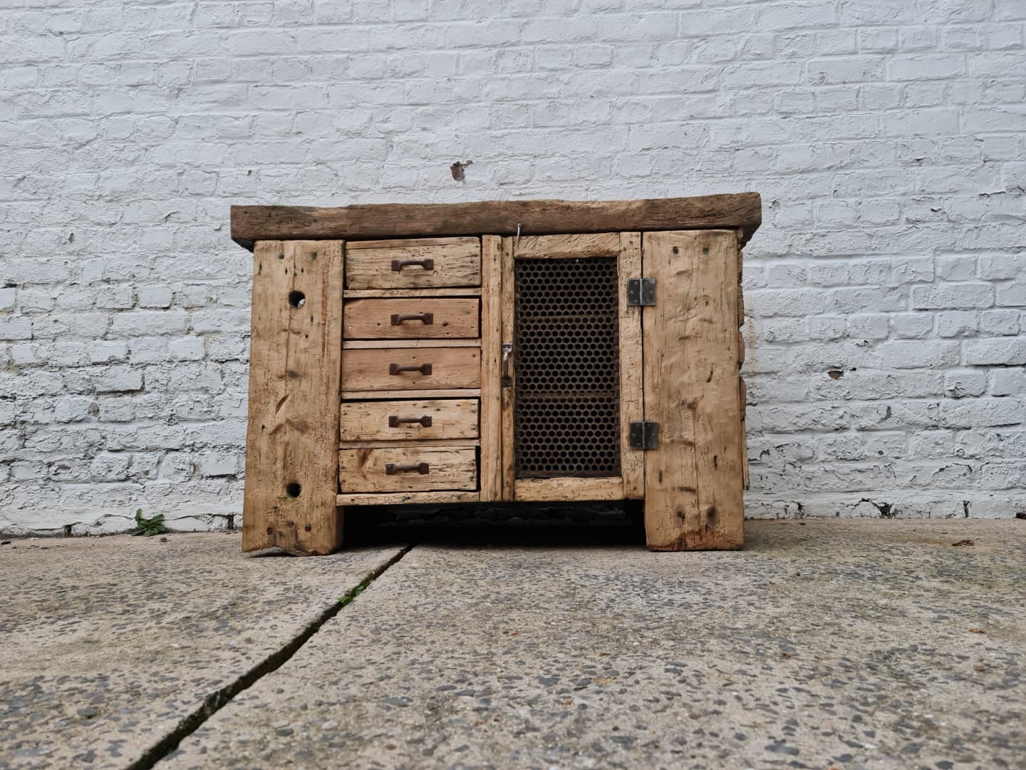 Old established a door and five drawers raw wood