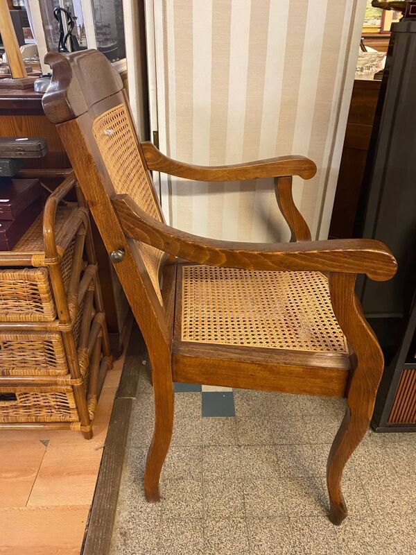 Fauteuil de barbier style Louis Philippe en hêtre assise et dossier en cannage