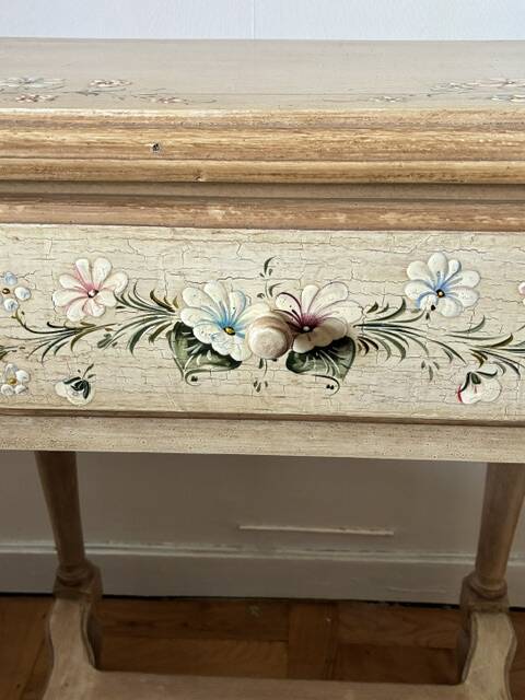 exotic wood console with a drawer