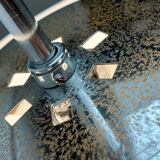 Minimalist suspended glass ball lamp from the vintage German space age by Glashütte Limburg, 1970s.