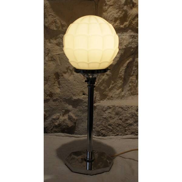 Chrome metal lamp with glass globe, Art Deco style, 20th century period.