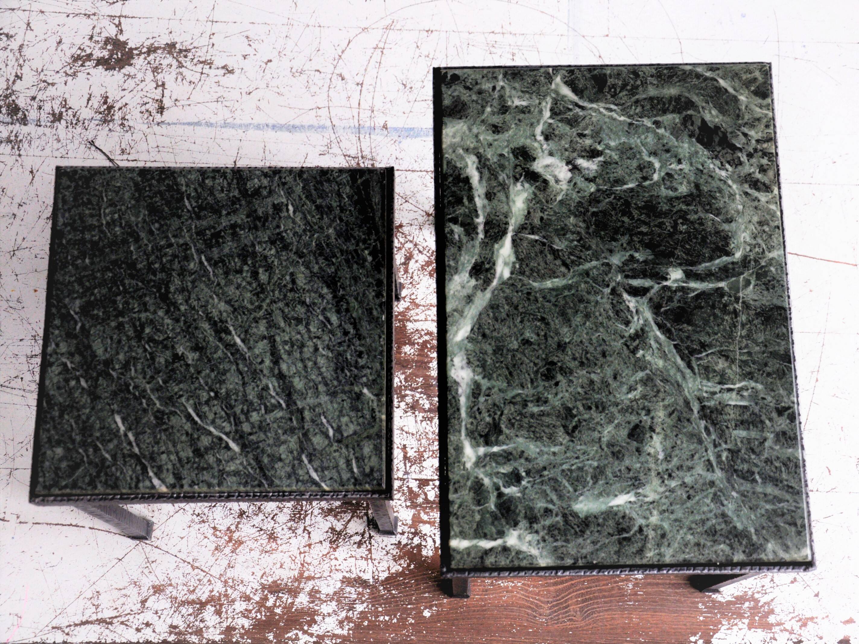 Green nesting coffee table with marble top and iron frame