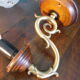 Wall lamps in wood and gilded metal, openwork glass lampshade