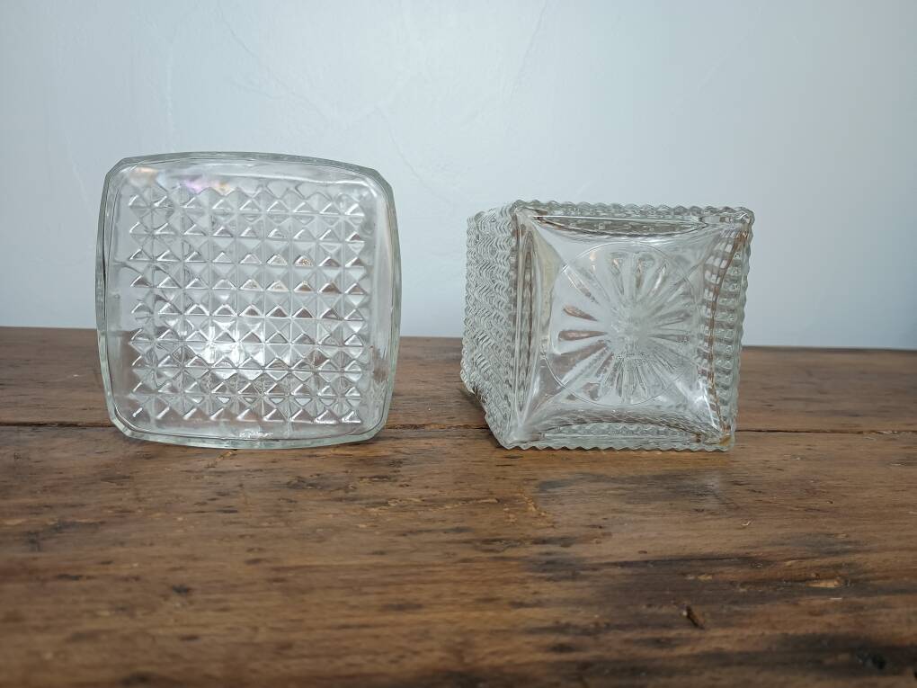 Mismatched pair of whisky decanters.