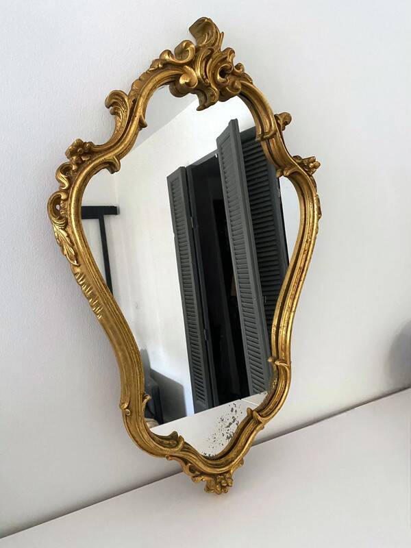 Old golden mirror in composite resin baroque style 60s