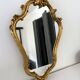 Old golden mirror in composite resin baroque style 60s