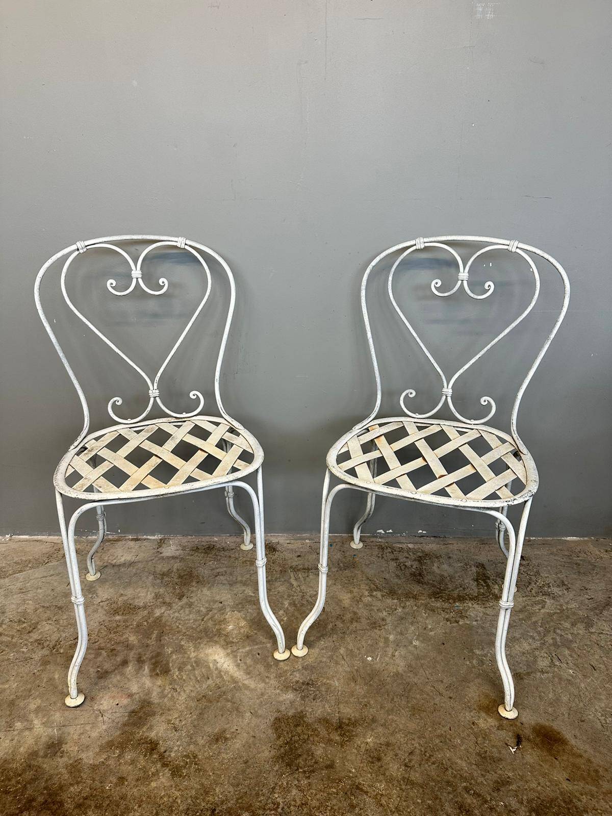 Pair of wrought iron chairs