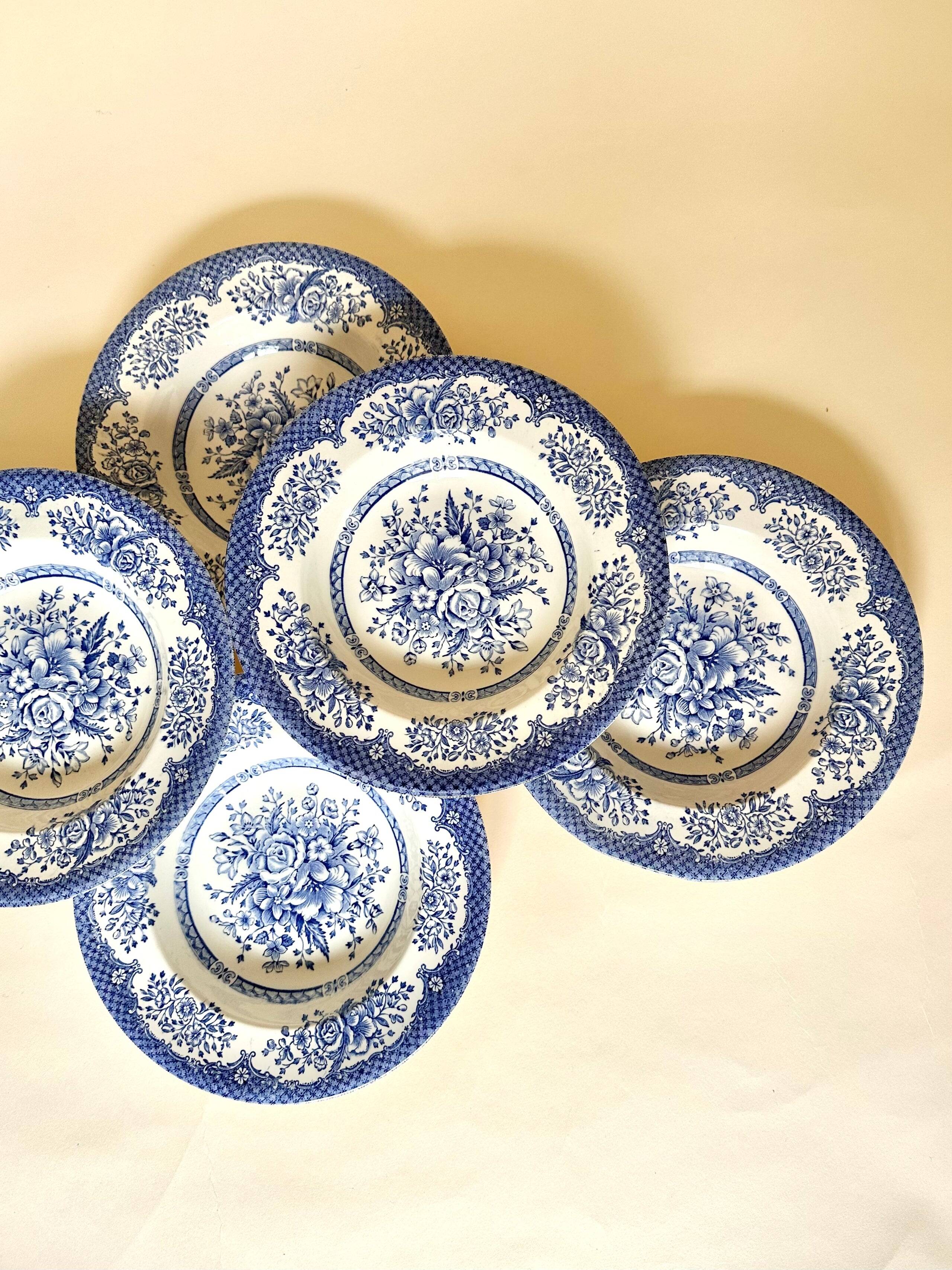 Set of six English deep plates, made of ironstone ceramic, floral patterns.