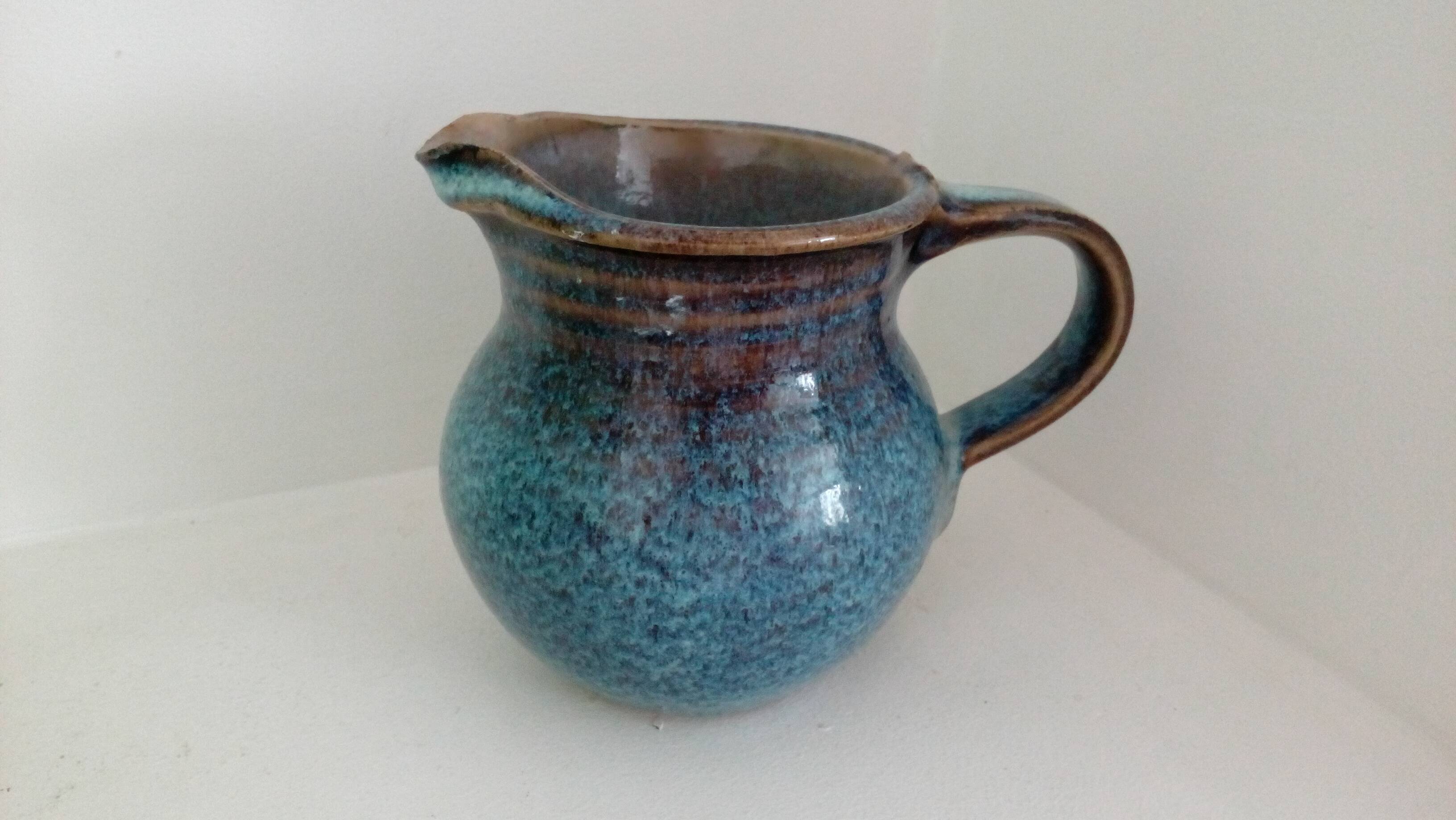 Pitcher in enamelled blue sandstone