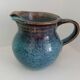 Pitcher in enamelled blue sandstone