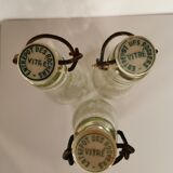 3 small old cider bottles